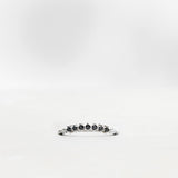 Finished: Idun Curved Diamond Band in White Gold with Black and White Diamonds
