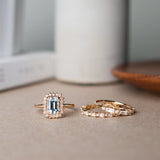 Solitaire Ring with Aquamarine and Diamond Halo