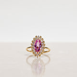 One-of-a-Kind Marquise Ring with a Unique Madagascar Sapphire and a Halo of Yellow Sapphires and Diamonds